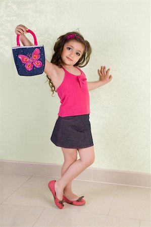 girl dance with bag Stock Photo - Budget Royalty-Free & Subscription, Code: 400-05093375