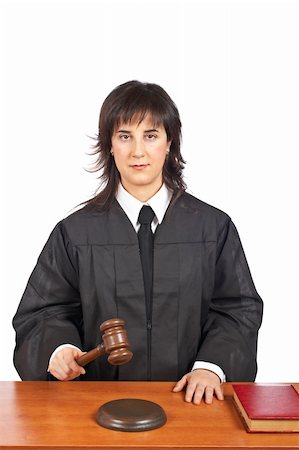 simsearch:700-00028739,k - A female judge in a courtroom striking the gavel. Shallow depth of field Stock Photo - Budget Royalty-Free & Subscription, Code: 400-05093384