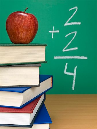 simsearch:625-01250891,k - An addition on the chalkboard with an apple on top of a pile of books. Stock Photo - Budget Royalty-Free & Subscription, Code: 400-05104672