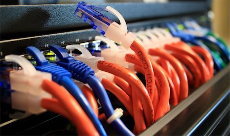 Network Cables in a Server Room with One Unplugged.  Networking Concept. Stock Photo - Budget Royalty-Free & Subscription, Code: 400-05105210