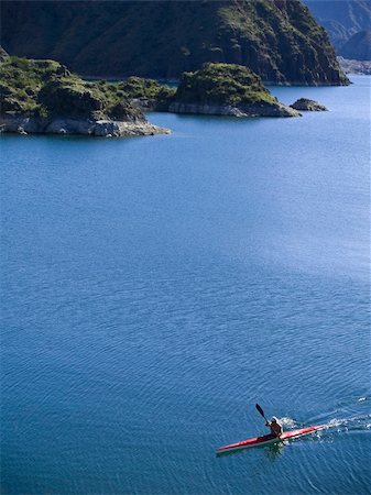 simsearch:400-05308802,k - A kayaker paddling across a peaceful lake. Stock Photo - Budget Royalty-Free & Subscription, Code: 400-05107287