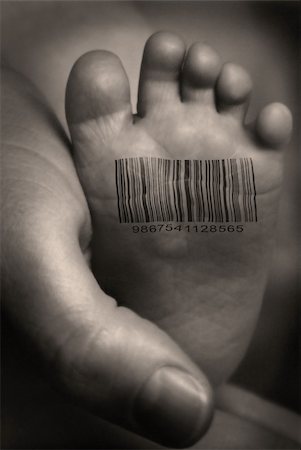 Babies foot with barcode Stock Photo - Budget Royalty-Free & Subscription, Code: 400-05103101