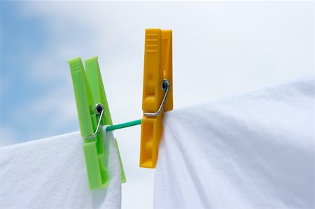 peg - Clothes drying on a rope outdoors Stock Photo - Budget Royalty-Free & Subscription, Code: 400-05114645