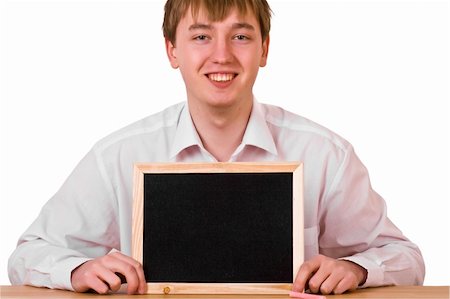 simsearch:400-04704759,k - Young Man with blank blackboard sitting on white background Stock Photo - Budget Royalty-Free & Subscription, Code: 400-05115266
