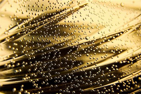 simsearch:622-07519538,k - Closeup of small bubbles on golden bacground Stock Photo - Budget Royalty-Free & Subscription, Code: 400-05116371