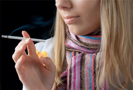 beautiful young girl smoking cigarette Stock Photo - Budget Royalty-Free & Subscription, Code: 400-05113232