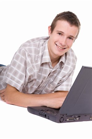 simsearch:400-04704759,k - casual teenager with laptop. over white background Stock Photo - Budget Royalty-Free & Subscription, Code: 400-05113382