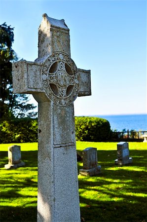 simsearch:400-04032243,k - Bright graveyard lawn with ancient celtic crosses Stock Photo - Budget Royalty-Free & Subscription, Code: 400-05113933
