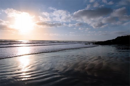 simsearch:400-05703164,k - the waves with reflection crashing in on youghal beach ireland Stock Photo - Budget Royalty-Free & Subscription, Code: 400-05124404