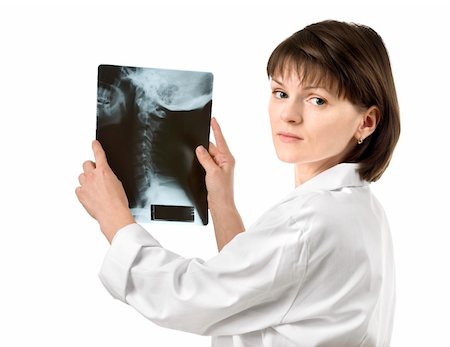 Female doctor showing the human neck x-ray Stock Photo - Budget Royalty-Free & Subscription, Code: 400-05129202