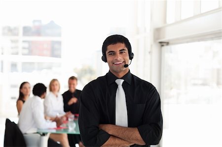 simsearch:400-03933798,k - Professional looking businessman witha headset on Stock Photo - Budget Royalty-Free & Subscription, Code: 400-05129750