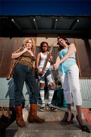 Three rough women on a house step Stock Photo - Budget Royalty-Free & Subscription, Code: 400-05120773