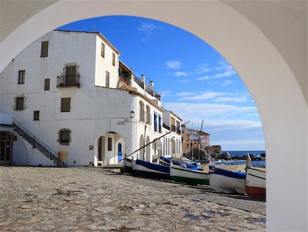 View through an arch of Calella de Palafrugell beach (Costa Brava, Catalonia, Spain) Stock Photo - Budget Royalty-Free & Subscription, Code: 400-05120996