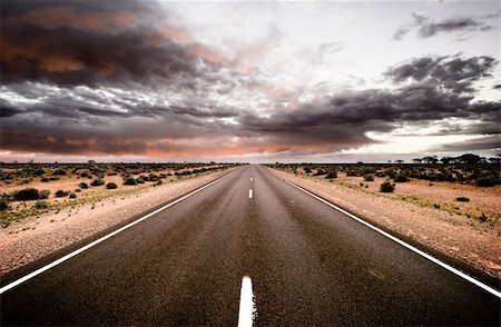 future of the desert - Road travels into the sunset Stock Photo - Budget Royalty-Free & Subscription, Code: 400-05122148