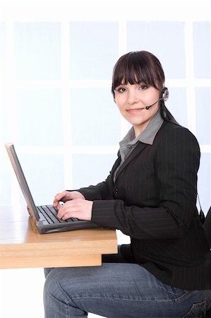 simsearch:400-05287143,k - attractive brunette woman in office Stock Photo - Budget Royalty-Free & Subscription, Code: 400-05122270