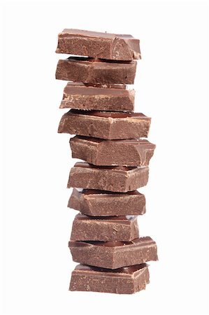 simsearch:400-05136453,k - Blocks of chocolate isolated on white background. Shallow depth of field Stock Photo - Budget Royalty-Free & Subscription, Code: 400-05136454