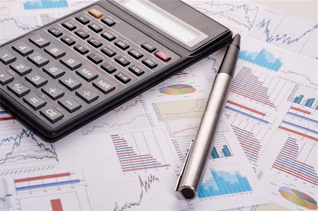 simsearch:400-08408451,k - financial statement with calculator and pen Stock Photo - Budget Royalty-Free & Subscription, Code: 400-05136483