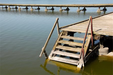 old wooden stairs on yellowish lake at Palic, Serbia Stock Photo - Budget Royalty-Free & Subscription, Code: 400-05137140