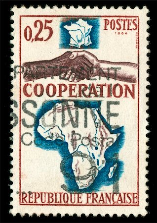 simsearch:400-04832369,k - vintage French stamp depicting a black and white man shaking hands in cooperation.between Africa and france Foto de stock - Super Valor sin royalties y Suscripción, Código: 400-05137754