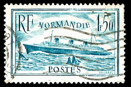 simsearch:400-04832369,k - vintage french stamp depicting the launch of the passenger liner SS Normandie in 1932. she is considered to be one of the greatest Ocean liners ever built Photographie de stock - Aubaine LD & Abonnement, Code: 400-05137771