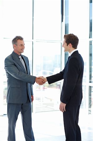 simsearch:400-04609965,k - Businessmen shaking hands in agreement Stock Photo - Budget Royalty-Free & Subscription, Code: 400-05139519