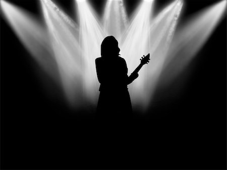 Black silhouette of the musician which plays on a scene Stock Photo - Budget Royalty-Free & Subscription, Code: 400-05139630