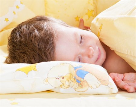 Portrait of a baby girl sleeping in bed Stock Photo - Budget Royalty-Free & Subscription, Code: 400-05130021