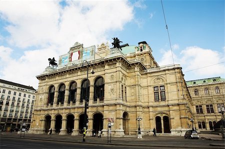 Tall building with statues on roof top in Vienna, Austria Stock Photo - Budget Royalty-Free & Subscription, Code: 400-05147674