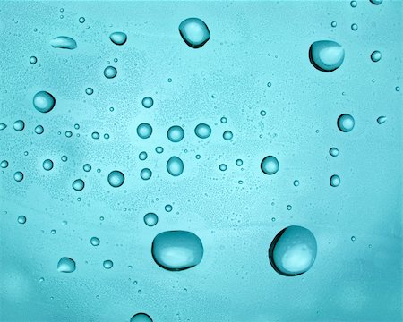 simsearch:400-05363406,k - Water droplets on transparent blue surface Stock Photo - Budget Royalty-Free & Subscription, Code: 400-05148409