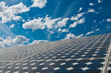 solar panel usa - solar panel with beautiful blue sky and clouds in background Stock Photo - Budget Royalty-Free & Subscription, Code: 400-05149440