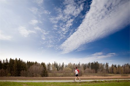 dreadlocks on old people - A runner with long hair and beard jogging in the country Stock Photo - Budget Royalty-Free & Subscription, Code: 400-05140125