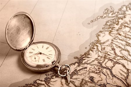 Old silver pocket watch on old map Stock Photo - Budget Royalty-Free & Subscription, Code: 400-05154145