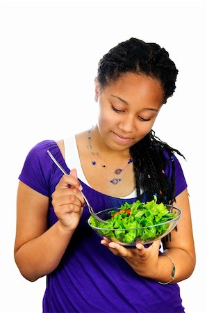 Isolated portrait of black teenage girl with salad bowl Stock Photo - Budget Royalty-Free & Subscription, Code: 400-05157050