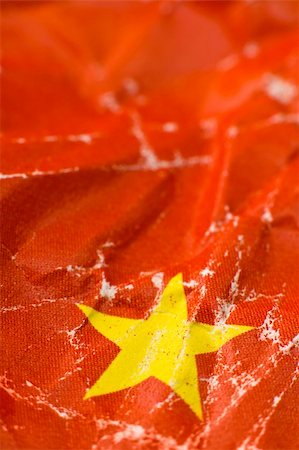 communism background, it is actually a small part of chinese flag, with yellow star in focus Photographie de stock - Aubaine LD & Abonnement, Code: 400-05157466