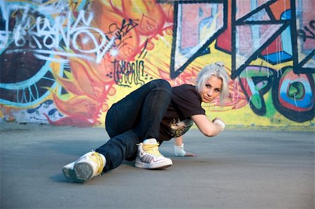 Young woman breakdancing Stock Photo - Budget Royalty-Free & Subscription, Code: 400-05158754