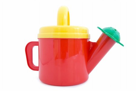 Toy watering can. Isolated on white background. Stock Photo - Budget Royalty-Free & Subscription, Code: 400-05150140