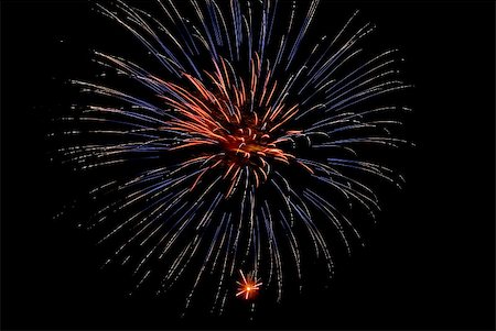 simsearch:400-04926313,k - Fireworks exploding in the dark of the evening sky. Stock Photo - Budget Royalty-Free & Subscription, Code: 400-05150150