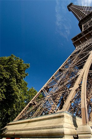 simsearch:400-04974897,k - Unusual perspective of the Eiffel Tower, taken with a wide angle lens, with a blue sky background Stock Photo - Budget Royalty-Free & Subscription, Code: 400-05152417