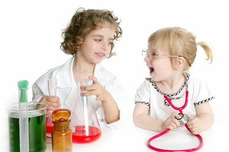 simsearch:400-07411030,k - Two girls pretending to be doctor in the laboratory Stock Photo - Budget Royalty-Free & Subscription, Code: 400-05152766
