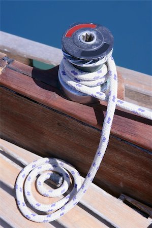 simsearch:400-05254289,k - Marine rope and winch over wooden deck and blue summer sea Stock Photo - Budget Royalty-Free & Subscription, Code: 400-05152768