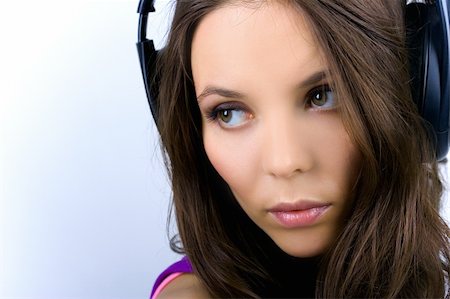 simsearch:400-04300097,k - Pretty young woman in earphones closely Stock Photo - Budget Royalty-Free & Subscription, Code: 400-05153271