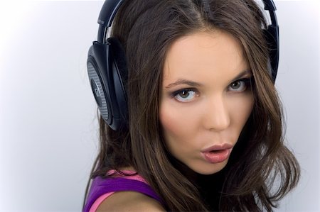 simsearch:400-04300097,k - Nice woman with headphones singing or saying something Stock Photo - Budget Royalty-Free & Subscription, Code: 400-05153474