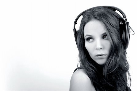 simsearch:400-04300097,k - Young dj girl with headphones on white background in monochrome Stock Photo - Budget Royalty-Free & Subscription, Code: 400-05153473