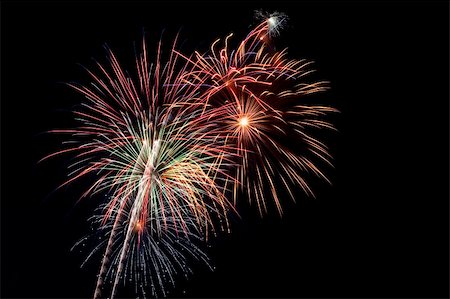 simsearch:400-04882938,k - Beautiful fireworks fill the night time sky Stock Photo - Budget Royalty-Free & Subscription, Code: 400-05165977