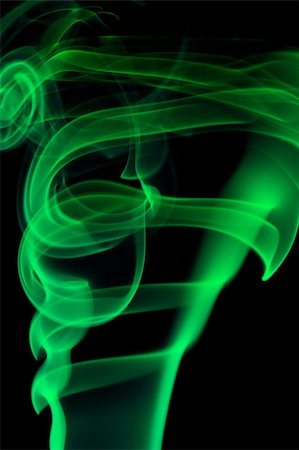 Abstract green smoke over black background Photographie de stock - Aubaine LD & Abonnement, Code: 400-05166365