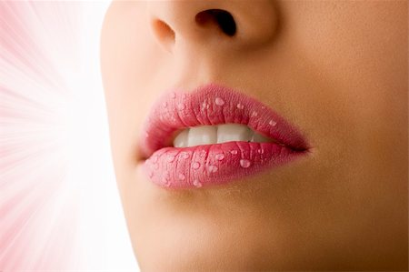 close up of woman mouth with pink lipstick and water drops on her lips Photographie de stock - Aubaine LD & Abonnement, Code: 400-05167106