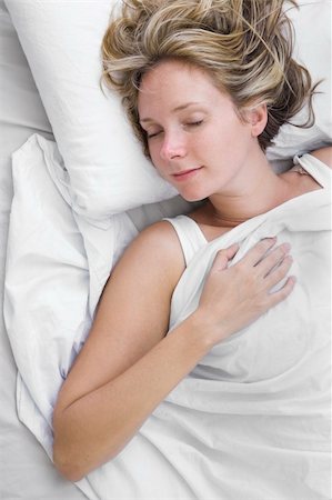 spanishalex (artist) - Woman asleep in bed wrapped in white sheets Stock Photo - Budget Royalty-Free & Subscription, Code: 400-05169012