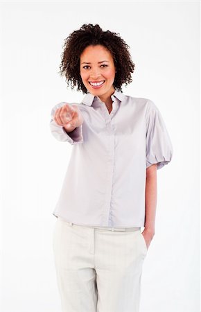 Afro-American businesswoman pointing and smiling at the camera Stock Photo - Budget Royalty-Free & Subscription, Code: 400-05160647