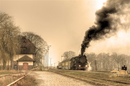 Old retro steam train stopped at the small station Stock Photo - Budget Royalty-Free & Subscription, Code: 400-05160824
