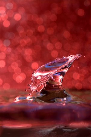 simsearch:614-06813723,k - Brightly coloured capture of a water drop collision Stock Photo - Budget Royalty-Free & Subscription, Code: 400-05161767